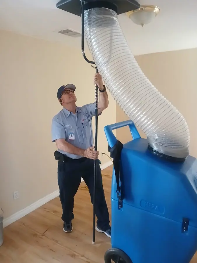 Mini Split Installation technician using HEPA equipment in Covina